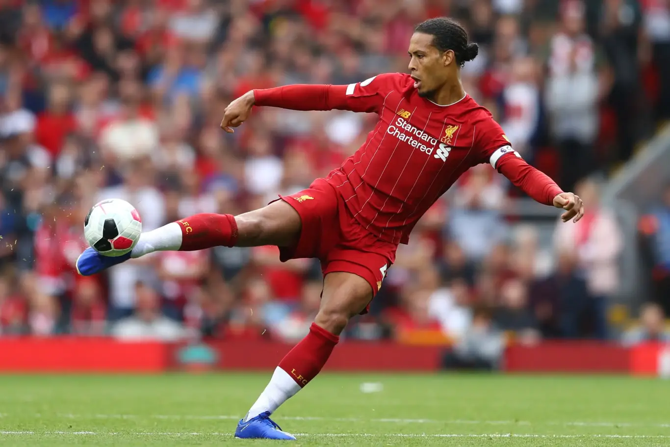 Player kicking ball mid-air during match — image for 1xBet APP